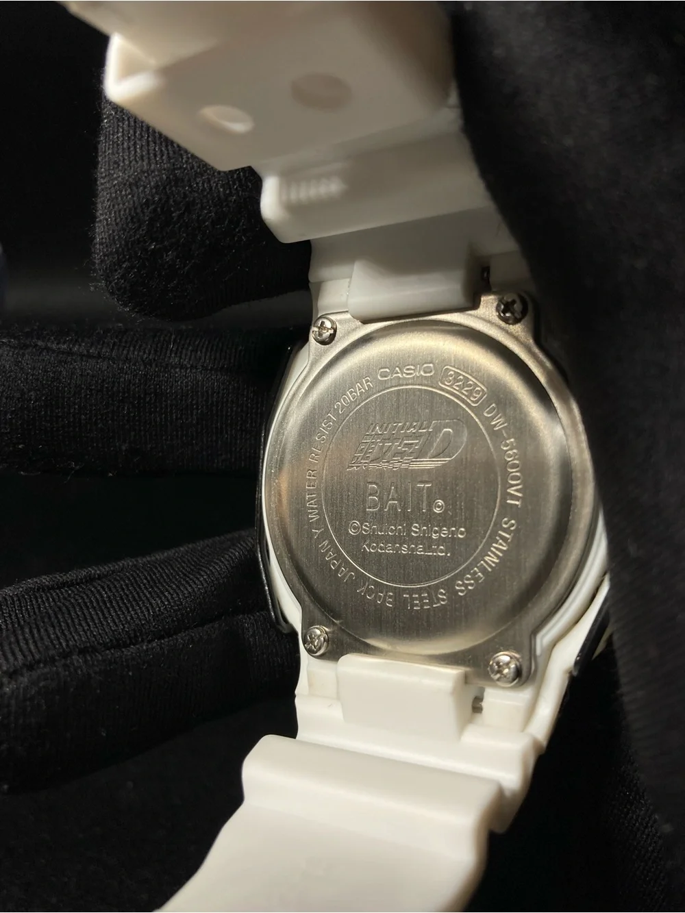 White and Black G Shock Dw5600